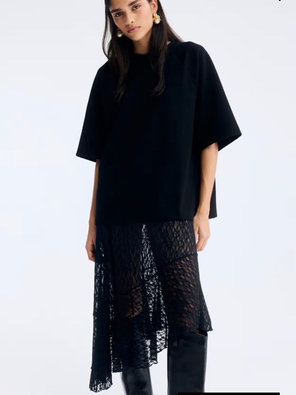 Asymmetrical lace midi skirt